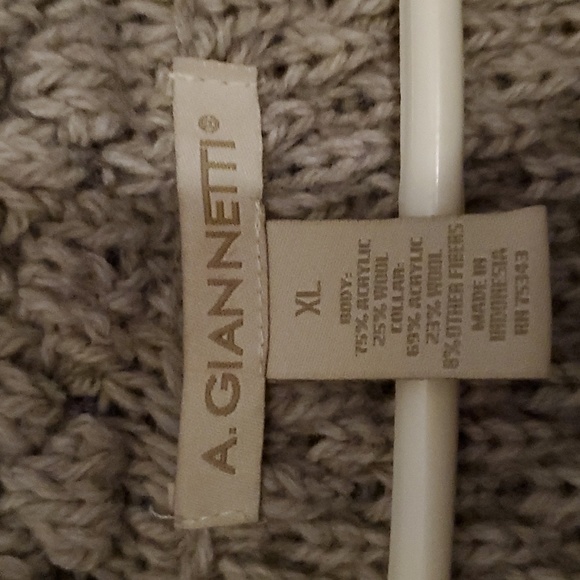 A. Gannett sleeveless sweater, Womens XL, a medium brown/tan in color. - Picture 2 of 9